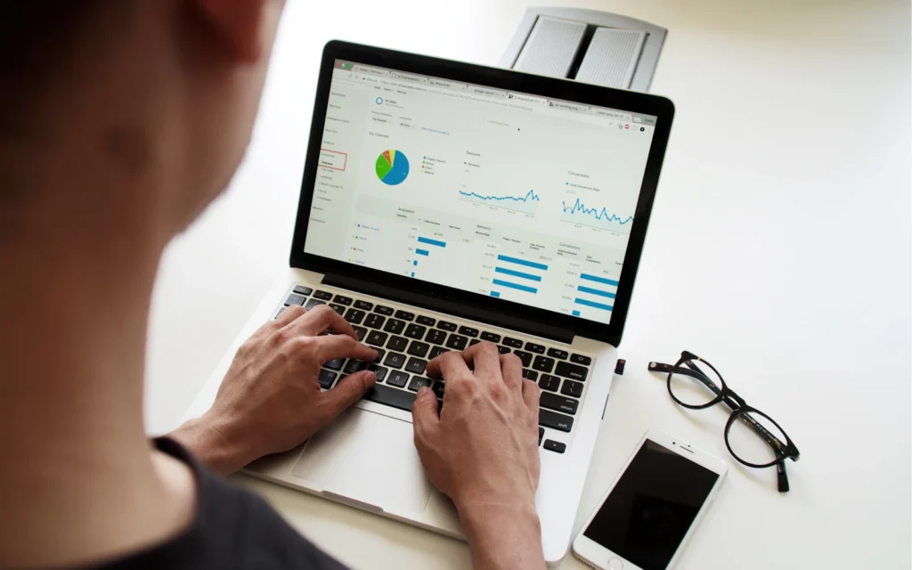 Laptop showing analytics while planning AI search optimization