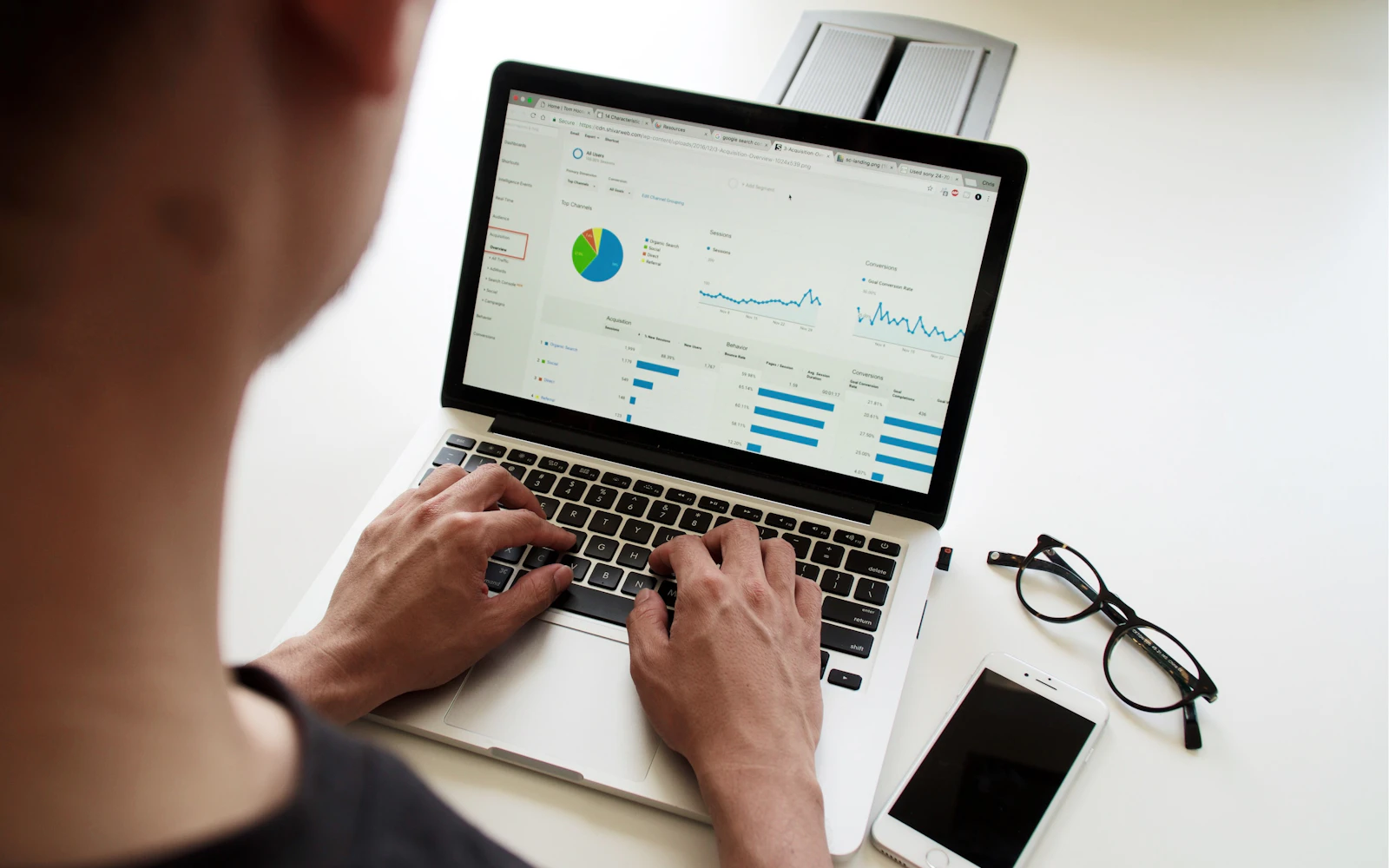 Laptop showing analytics while planning AI search optimization
