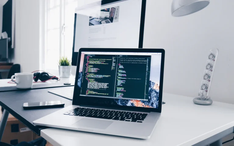 Web developer comparing the best WordPress hosting options on a laptop