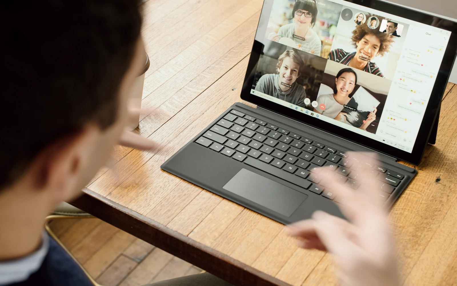 Business coach running a discovery call on a laptop