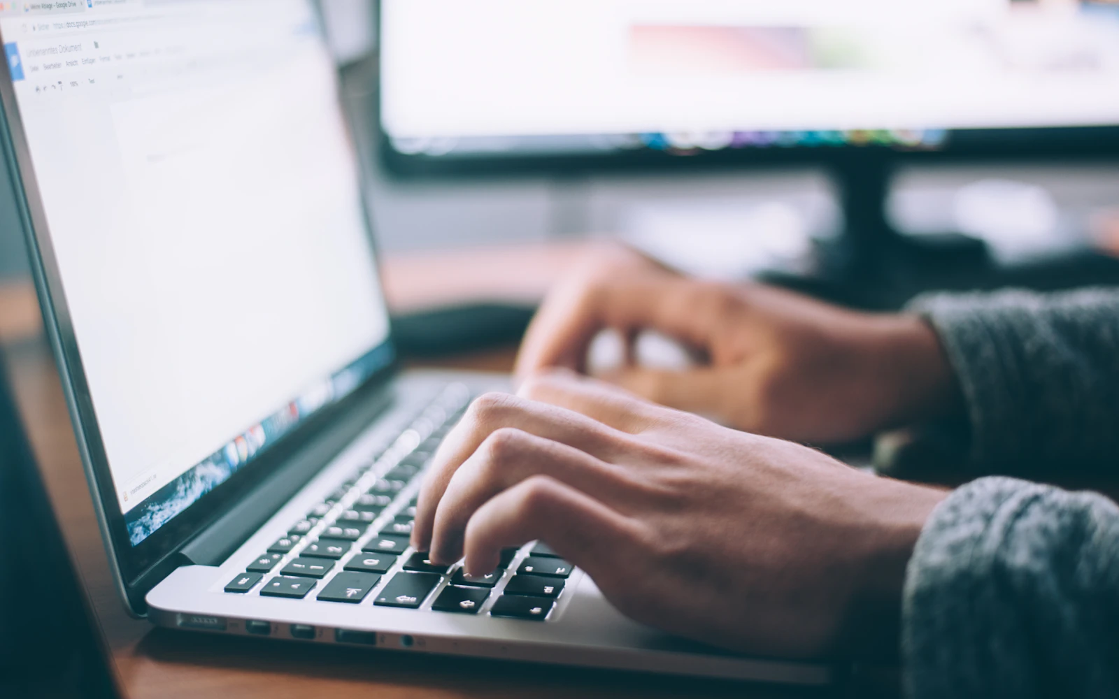 Small business owner planning email marketing for small business on a laptop