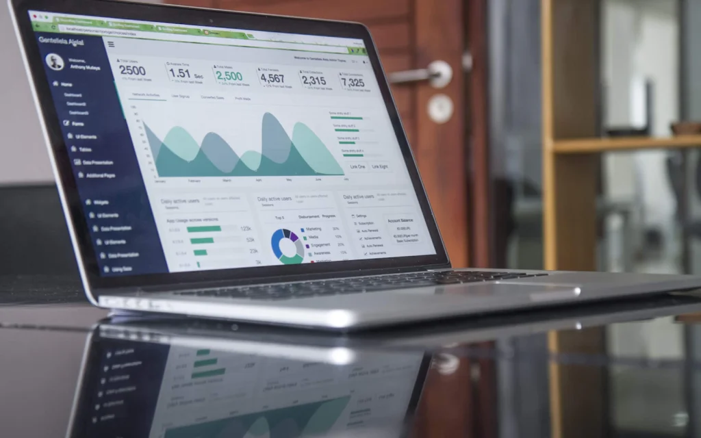 Consultant reviewing Google Ads for consultants campaign results on a laptop