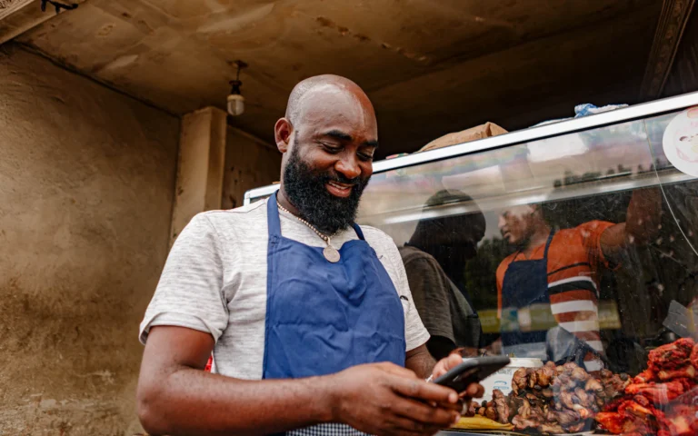 Small business owner in his shop, ready for Google Business Profile optimization