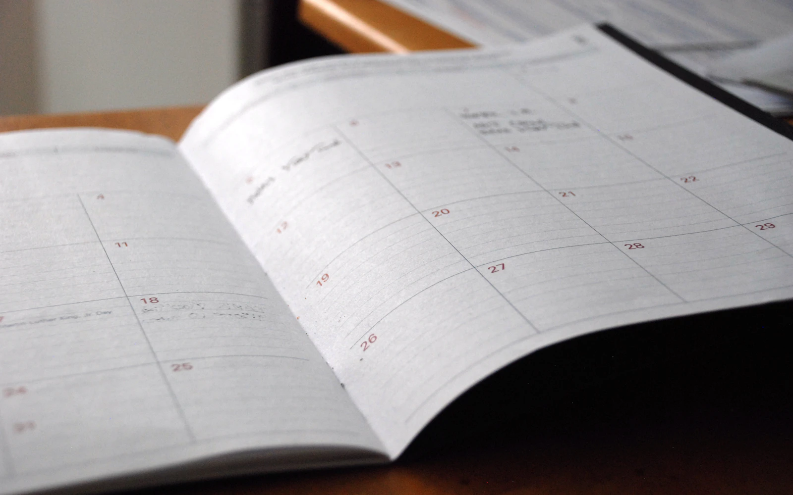 Planner and desk, mapping out how long does SEO take