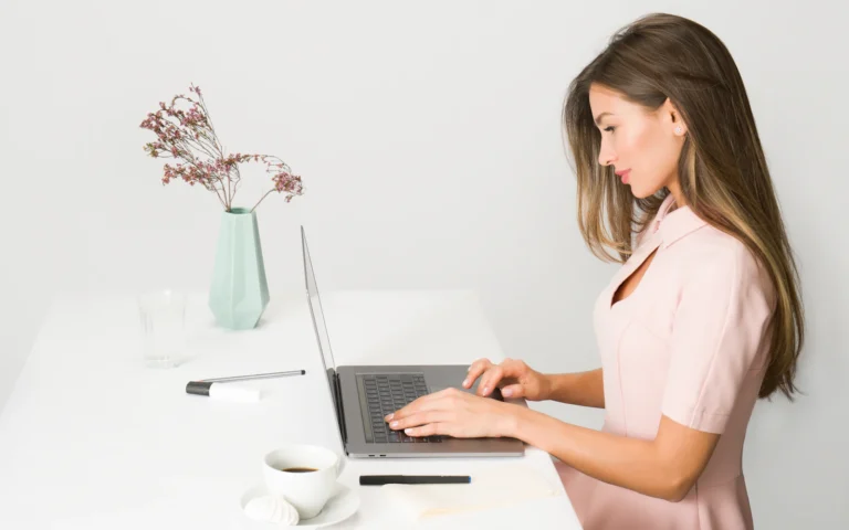 Consultant doing keyword research for small business on a laptop