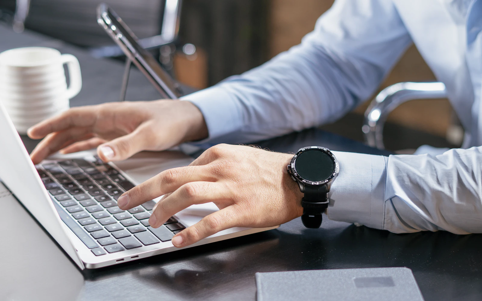 Solo attorney reviewing an online intake form on a laptop