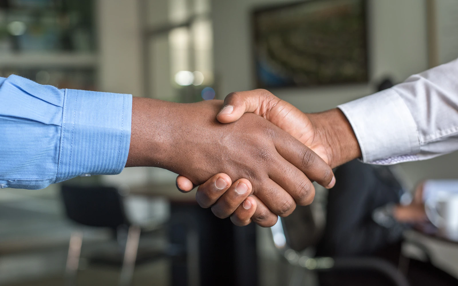 Consultant meeting a new client after a referral introduction