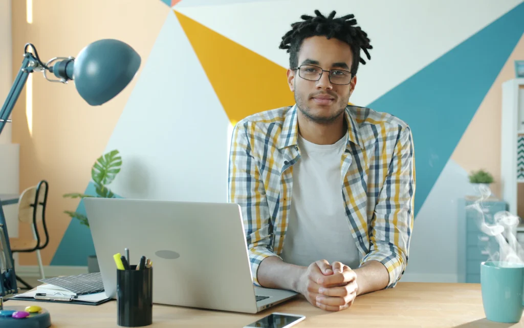 Consultant working on local SEO for small business rankings from his office