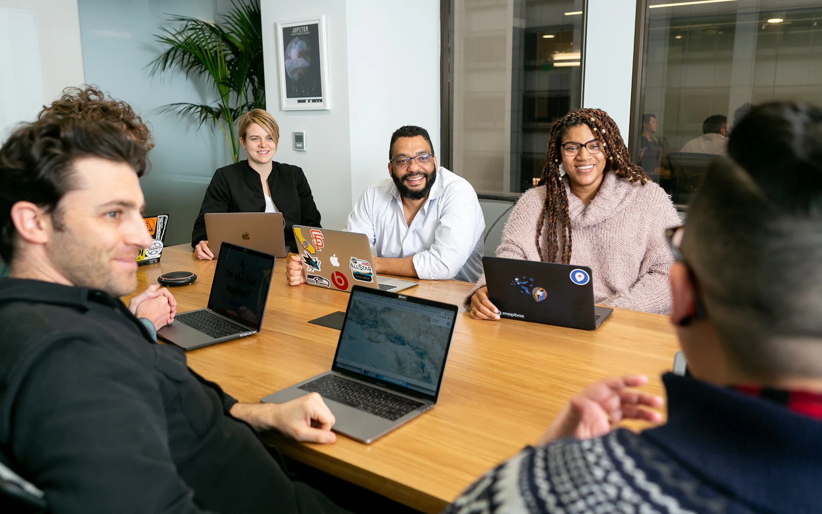 Small professional firm team reviewing local search results together