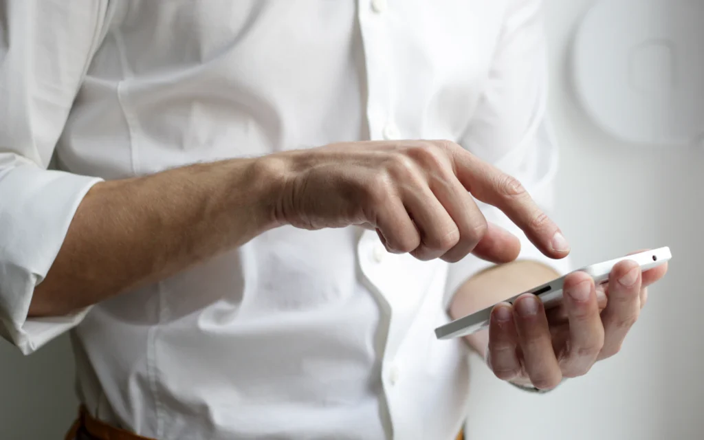 Professional browsing a site built with mobile friendly website design