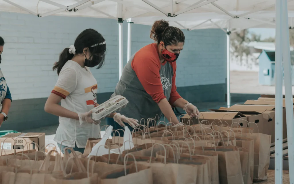 Volunteers working together, the people good nonprofit website design should welcome