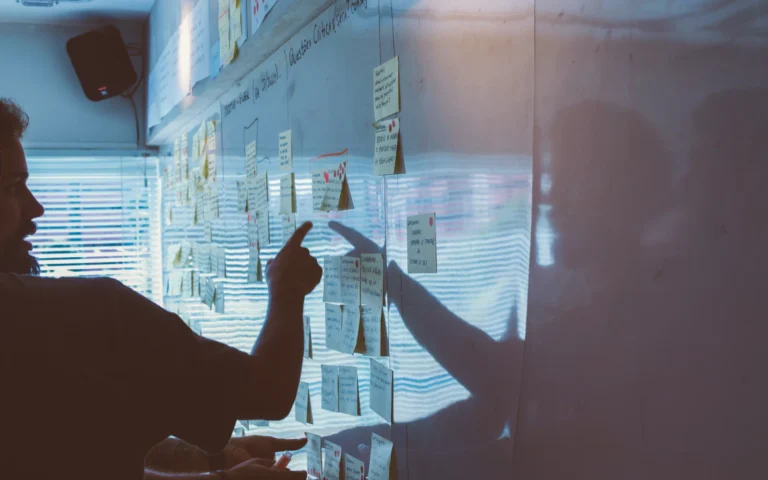 Team discussion while working through a rebranding checklist
