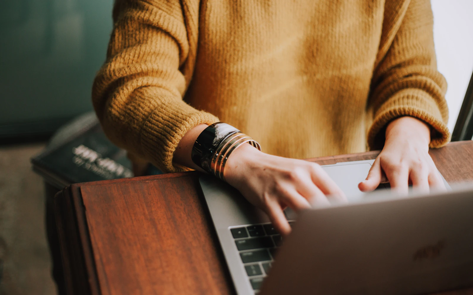 Ecommerce entrepreneur reviewing store traffic on a laptop