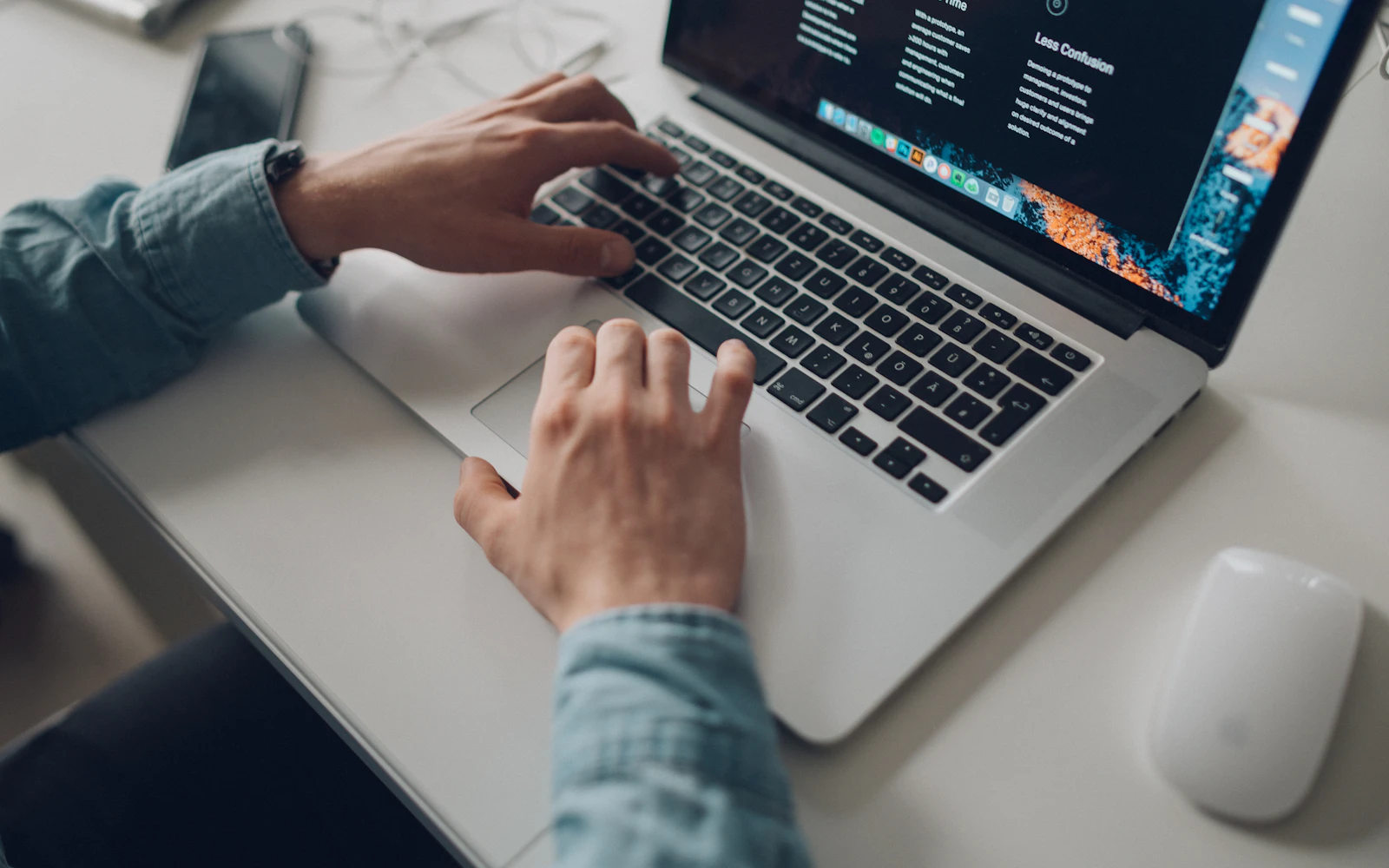 Designer adjusting Squarespace SEO settings on a laptop