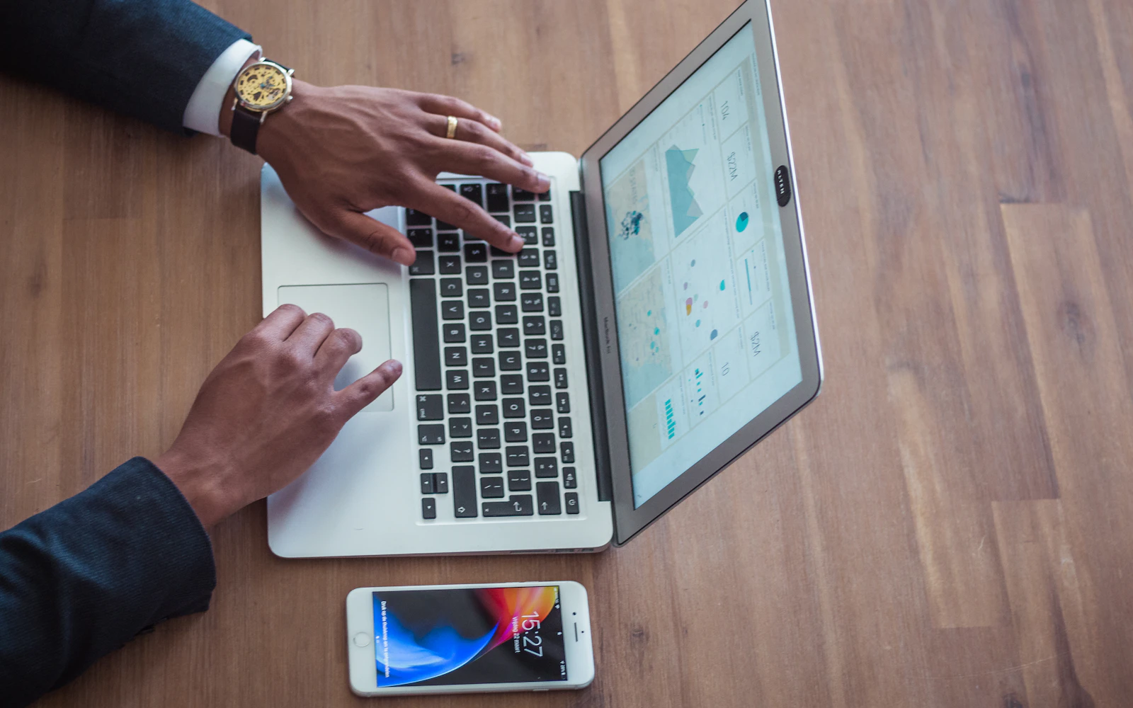 Consultant reviewing Google Search Console reports on a laptop at a desk