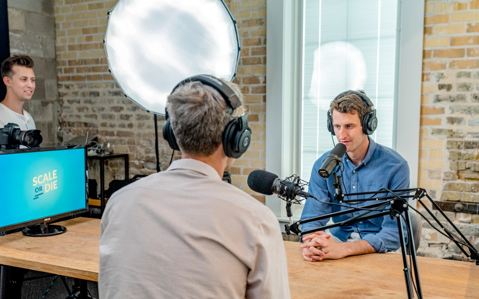 Experts recording a podcast interview to share their point of view