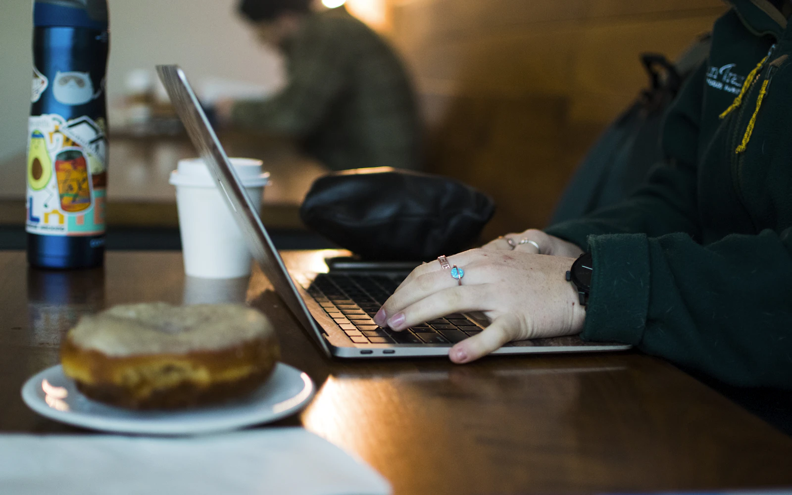 Small business owner checking website analytics on a laptop