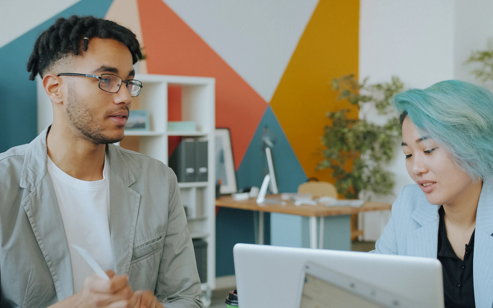 Consultant reviewing a new website with a designer