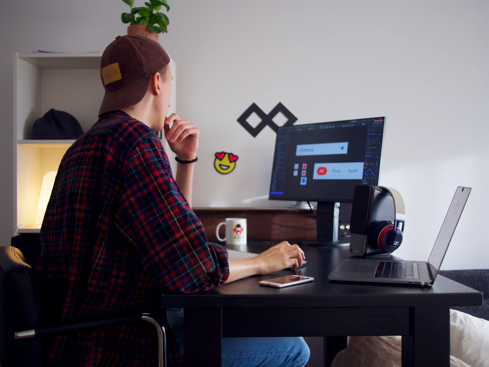 Designer delivering website design services for a consultant