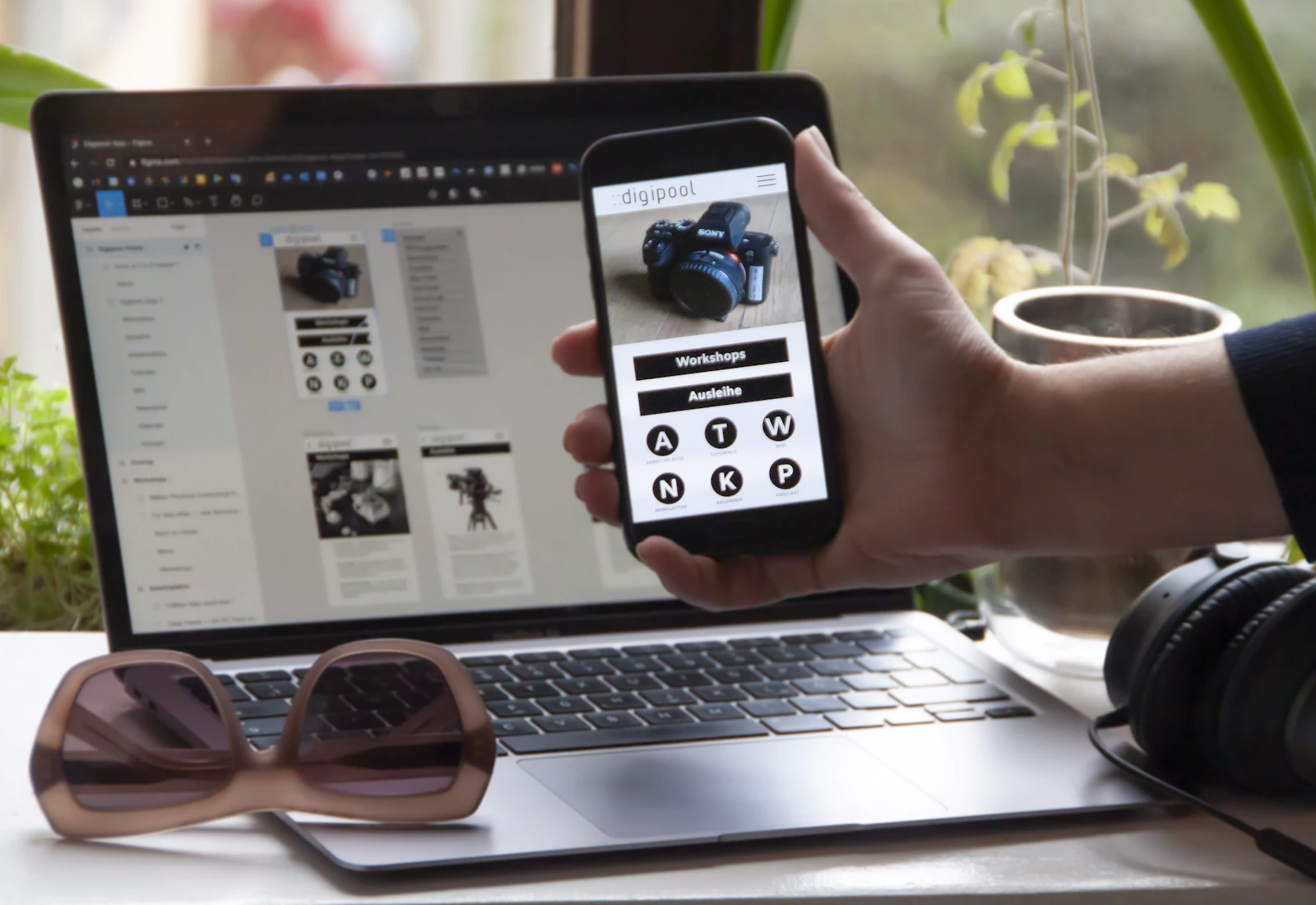 Mobile first website design shown on a phone and laptop