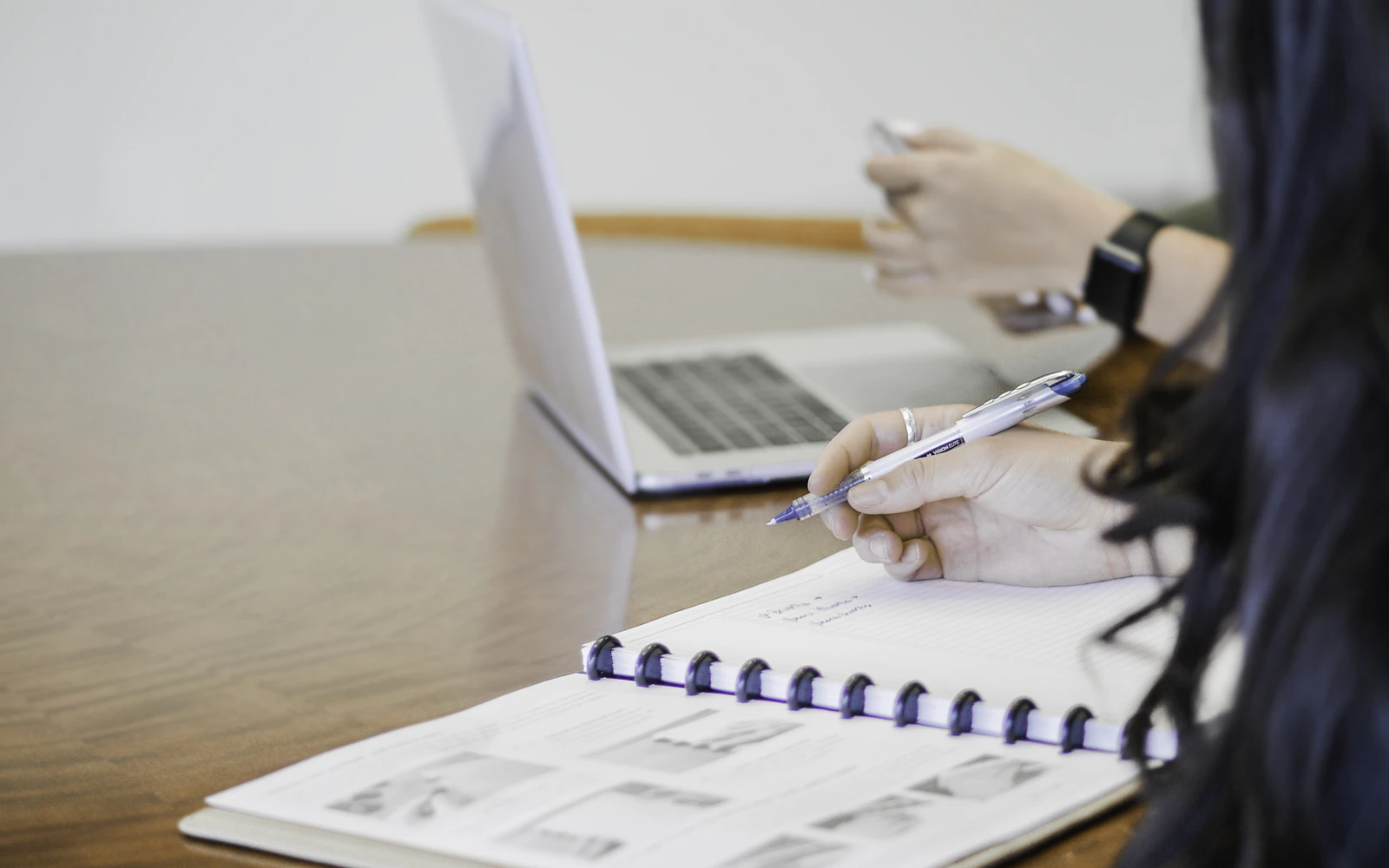 Professional planning email content in a notebook