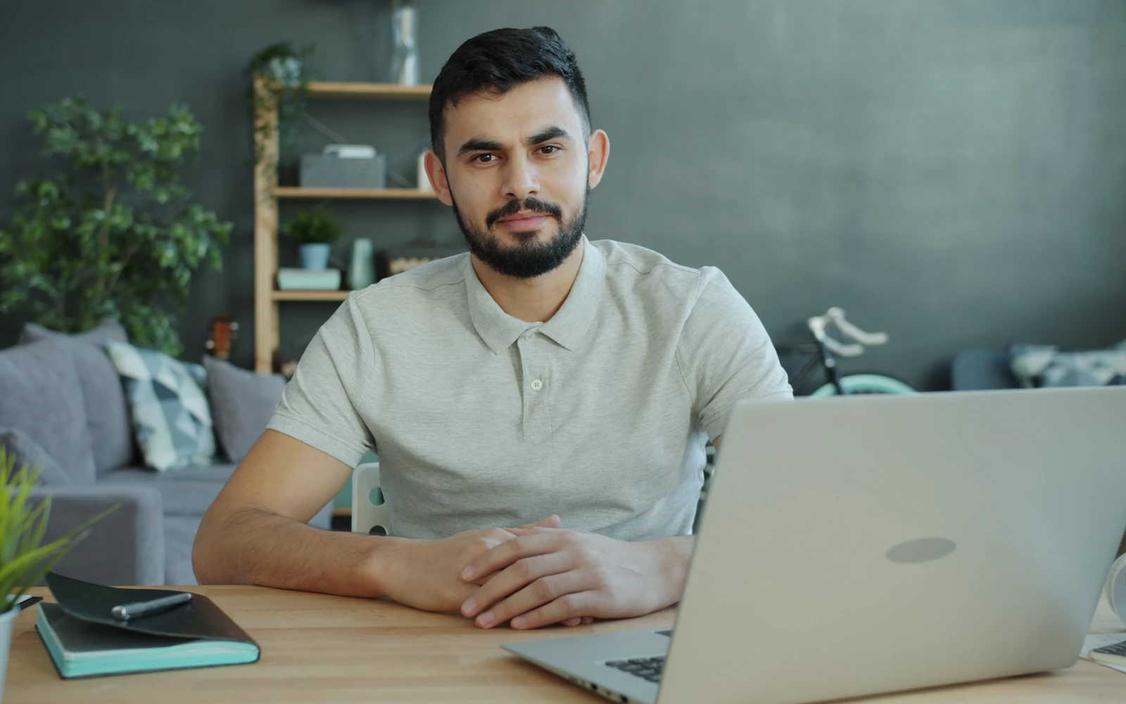 Small business owner editing a website at a desk