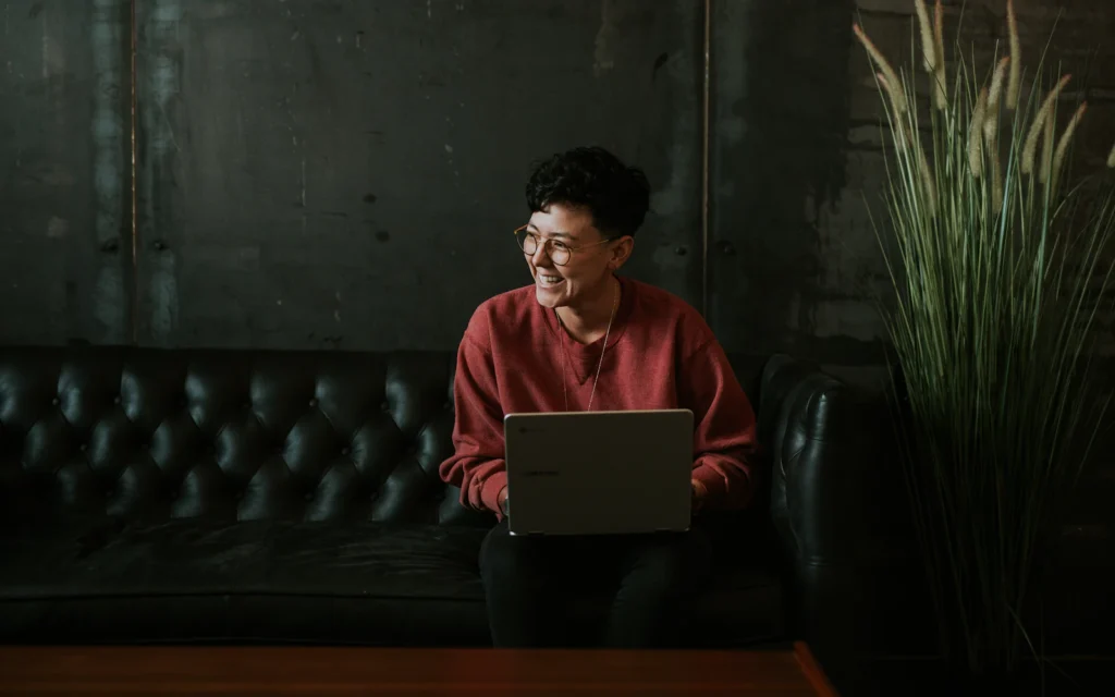Business owner weighing Wix vs WordPress on a laptop