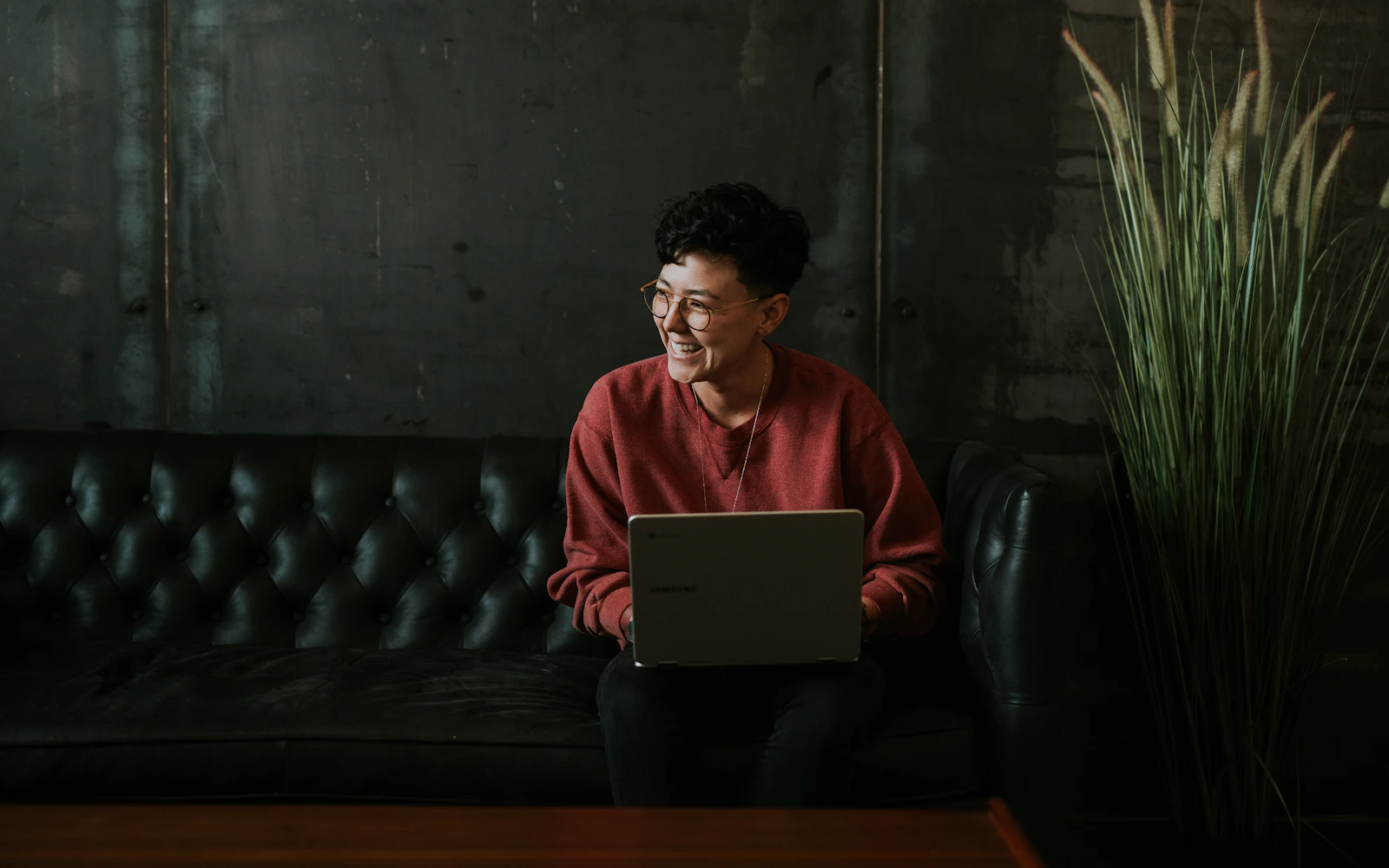 Business owner weighing Wix vs WordPress on a laptop