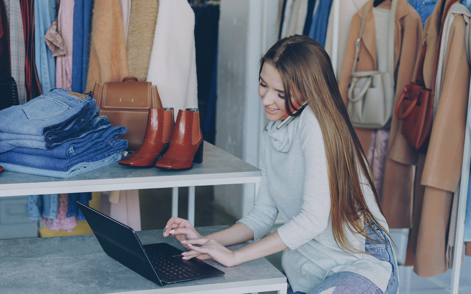 Small business owner choosing WordPress plugins for small business on a laptop